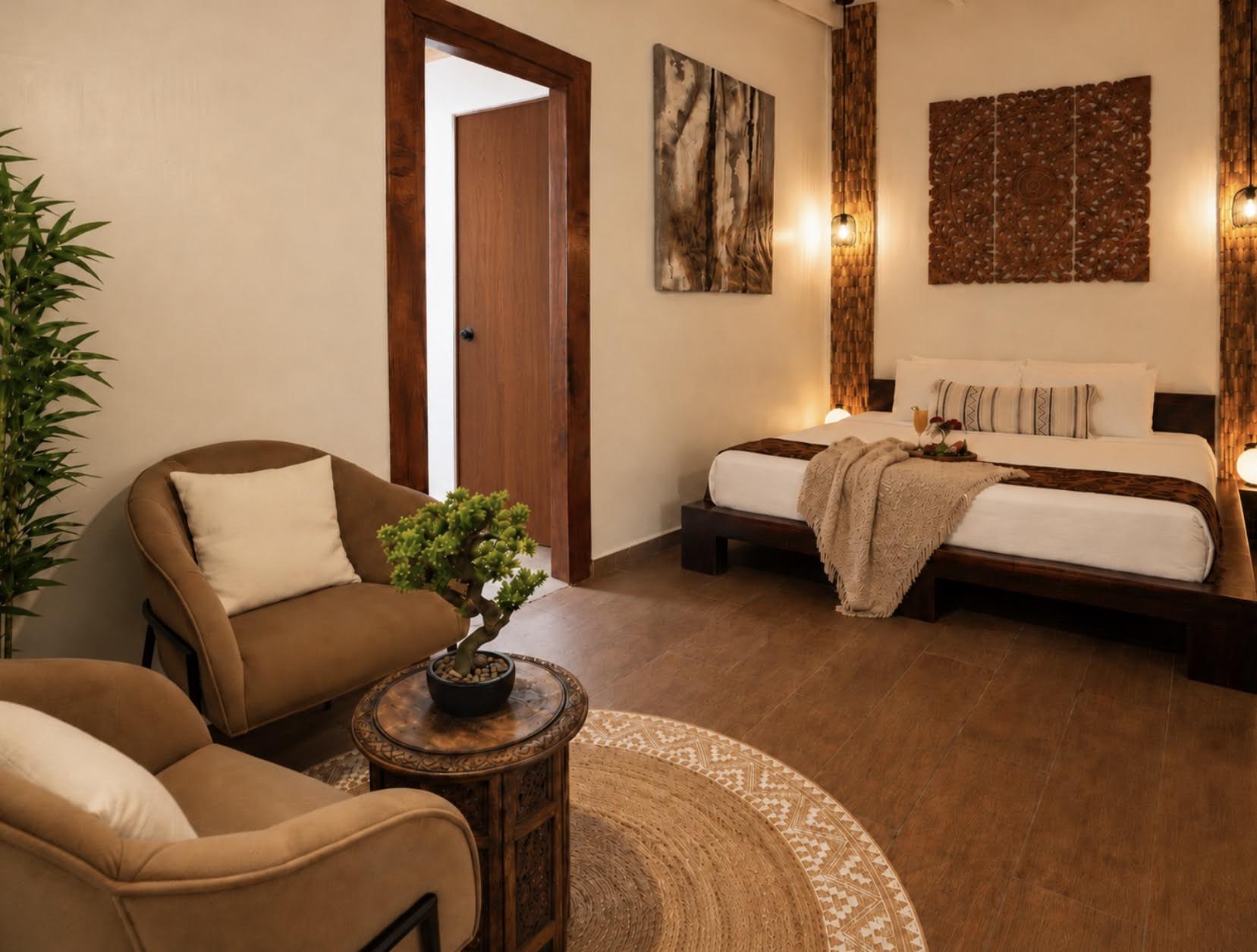 King-size bed and sitting area in the Japanese-inspired Family Suite at Bali Retreat Aruba
