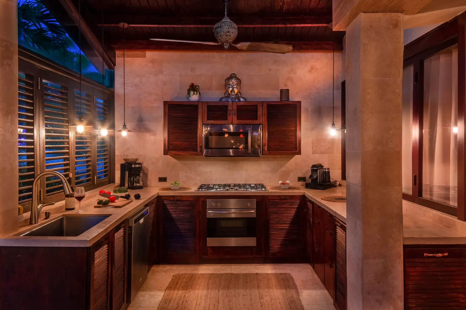 Full-size, fully equipped open-air tropical kitchen at Bali Retreat Aruba